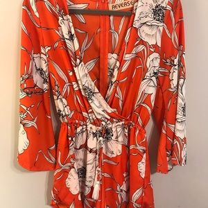 Orange floral print romper